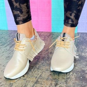 Fringe tennis shoes.